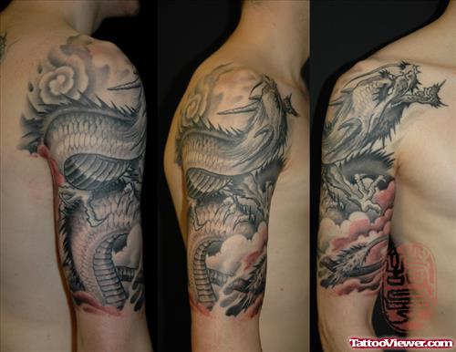 Grey Ink Asian Tattoo On Half Sleeve