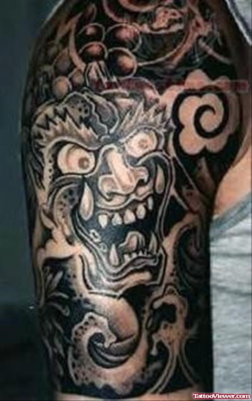 Grey Inki Asian Tattoo On Right Half Sleeve