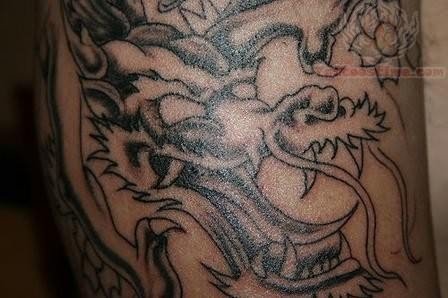 Grey Ink Asian Tattoo On Right Half Sleeve