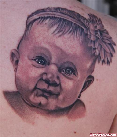 Grey Ink Cute Baby Head Tattoo On Right Back Shoulder