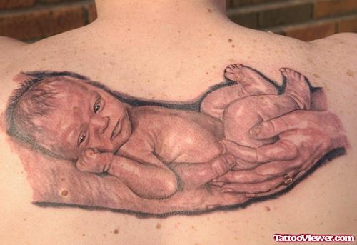 Grey Ink Baby Sleeping Tattoo On Back Body