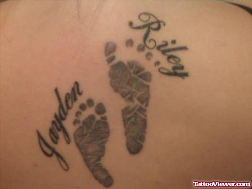 Awesome Grey Ink Baby Footprints Tattoo