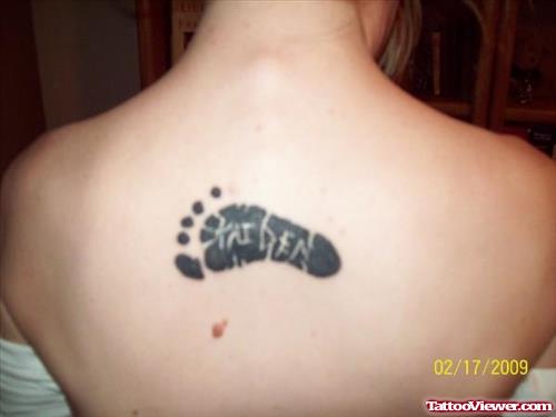 Baby Feet Tattoo On Back