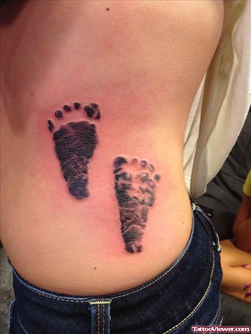 Side Rib Baby Footprints Tattoos