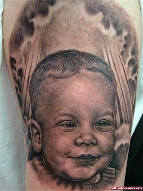 Grey Ink Child Baby Tattoo On Half Sleeve