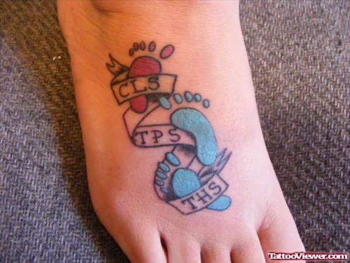 Awesome Baby Footprints Tattoo On Right Foot