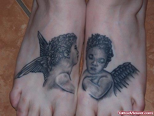 Grey Ink Baby Angels Tattoos On Feet