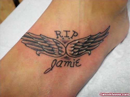 Rip Angel Winged Baby Tattoo On Left Foot