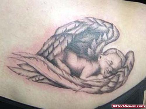 Grey Ink Sleeping Angel Tattoo On Upperback