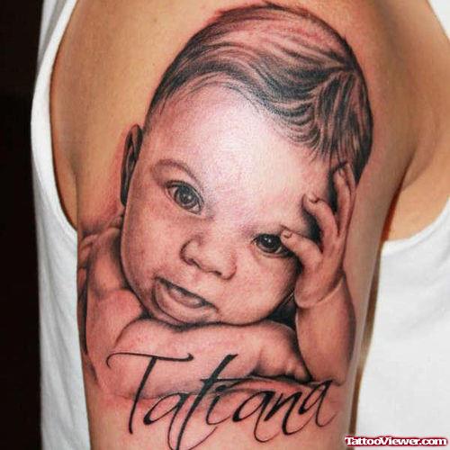 Grey Ink Baby Tattoo On Right Half Sleeve