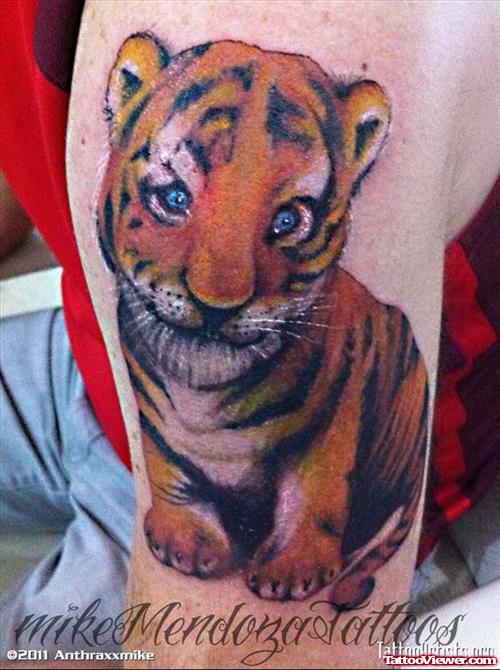 Baby Tiger Colored Tattoo On Half Sleeve