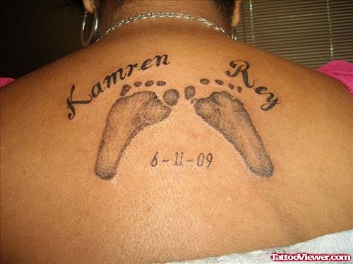 Baby Names And Baby Footprints Tattoos On Upperback