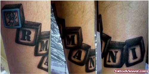Baby Name In Blocks Tattoo On Arm
