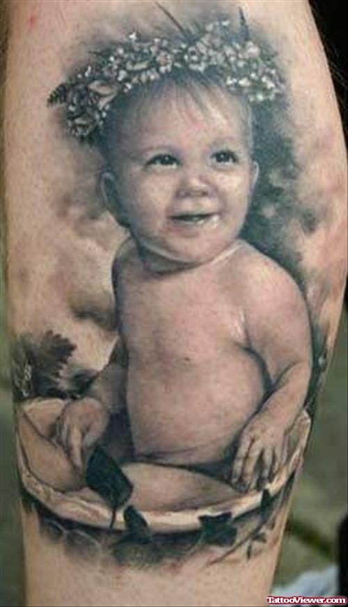 Amazing Grey Ink Baby Tattoo On Sleeve