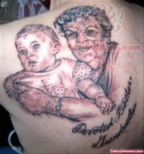 Mother And Baby Tattoo On Back
