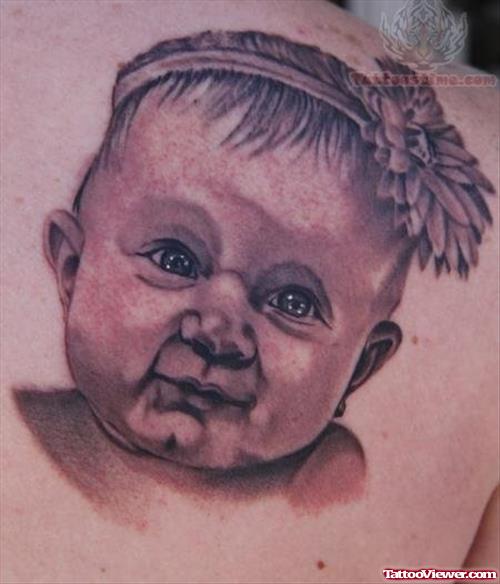 Black And Grey Baby Portrait Tattoo