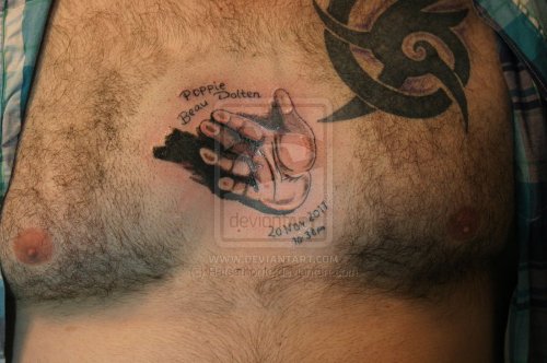 Grey Ink Baby Hand Tattoo On Man Chest