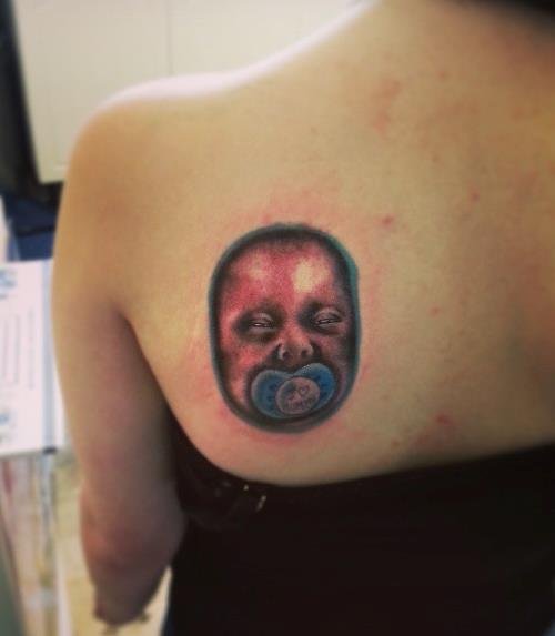 Baby Head Tattoo On Left Back Shoulder
