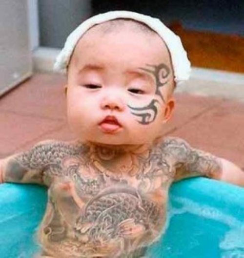 Tribal Tattoo On Baby Face