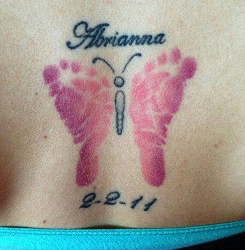 Memorial Baby  Footprints In Butterfly Shape Tattoo On Lower Back
