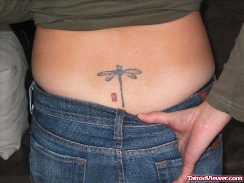 Dragonfly Tattoo On Girl Lower Back