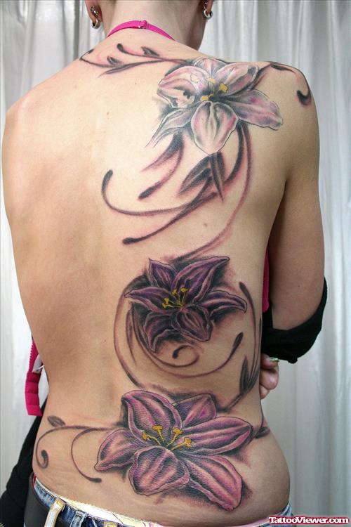 Colored Lily Flowers Back Tattoo