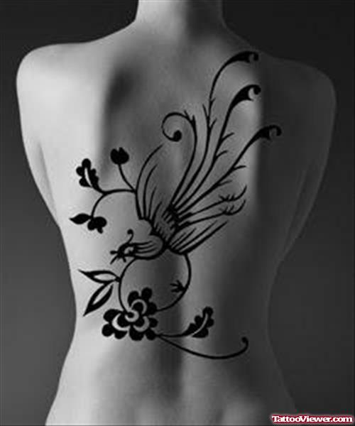 Black Flowers And Bird Back Tattoo