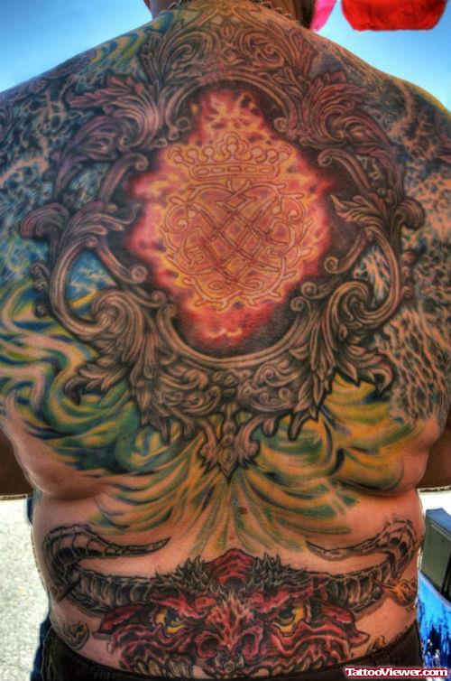 Colored Floral And Red Dragon Back Tattoo
