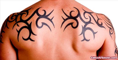 Upperback Tribal Black Ink Tattoos