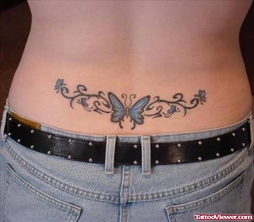 Blue Ink Butterfly Lowerback Tattoo For Girls