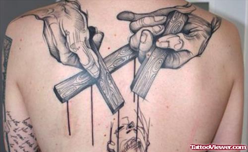 Cross In Hand Grey Ink Back Tattoo