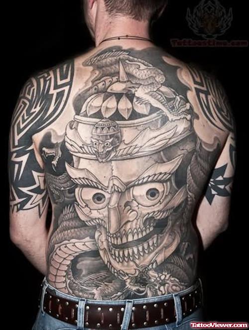 Grey Ink Soldier Head Tattoo On Back