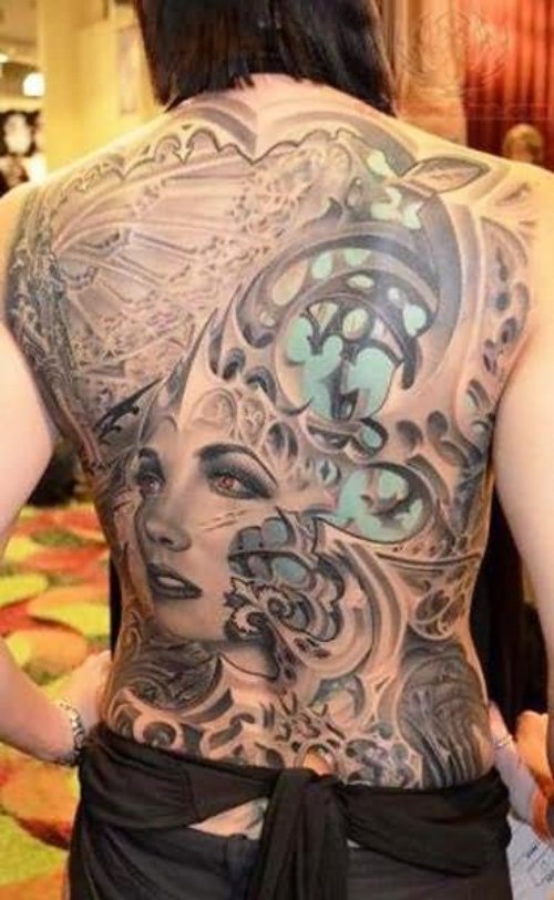 Biomechanical And Girl Face Tattoo On Back