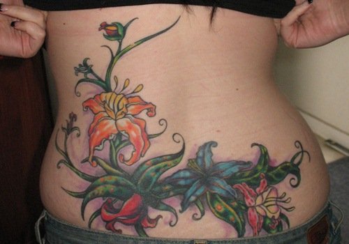 Amazing Colored Flowers Lower Back Tattoo