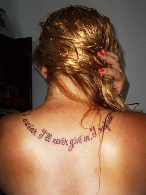 IвЂ™ll Never Give In - Lettering Tattoo On Upperback