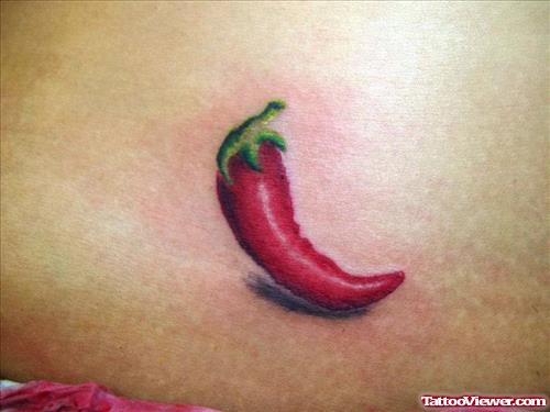 red chilli pepper tattoo on back