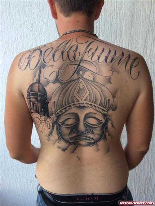 evil genie tattoo on back