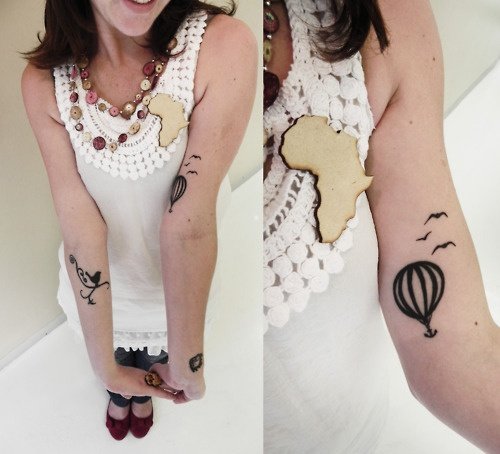 Black Ink Balloon Tattoo On Arm