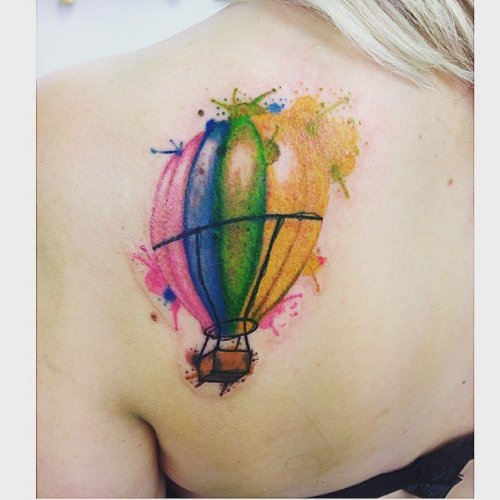 Color Splash Hot air Balloon Tattoo On Girl’s Back Shoulder
