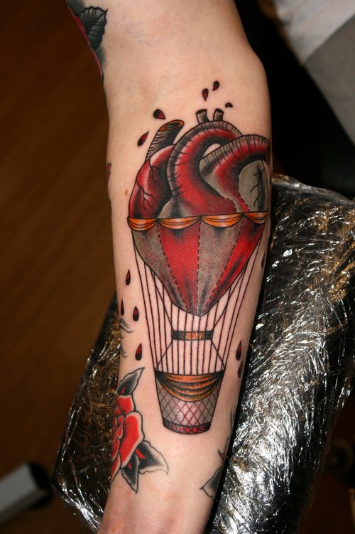 Red Ink Balloon Tattoo On Arm