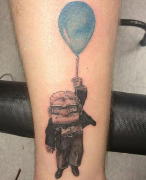 Old Man With Blue Balloon Tattoo On Leg