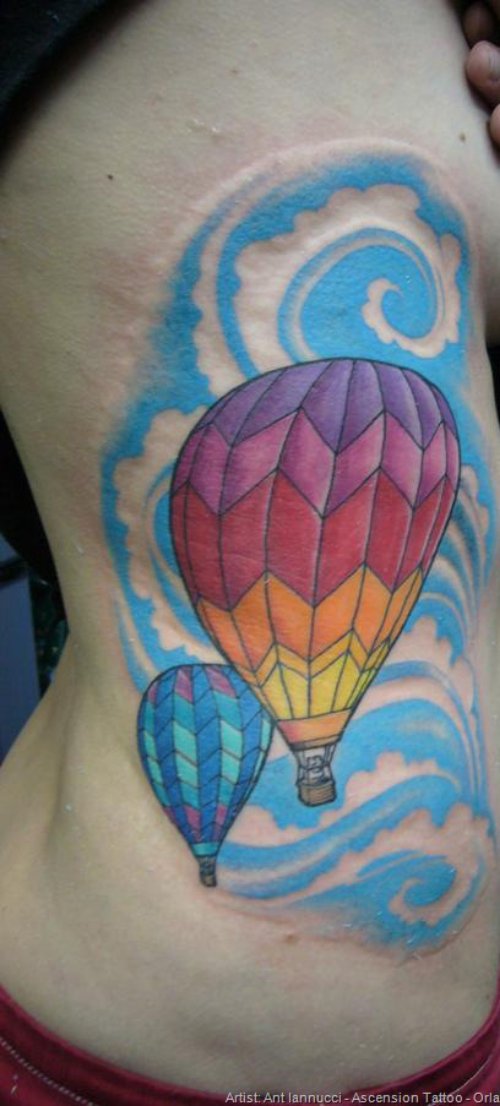 Colored Hot Air Balloon Tattoo On Side Rib