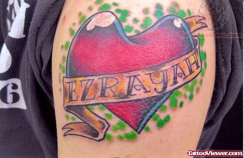 Colored Heart And Banner Tattoo On Biceps