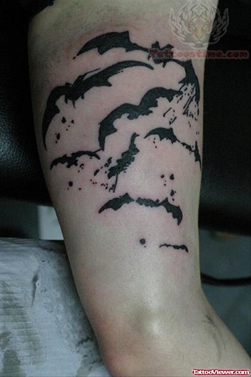 Black Ink Bat Tattoos On Biceps