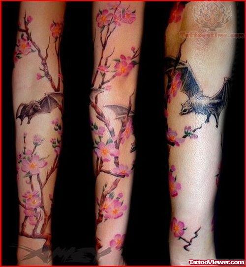 Flowers And Bat Tattoos