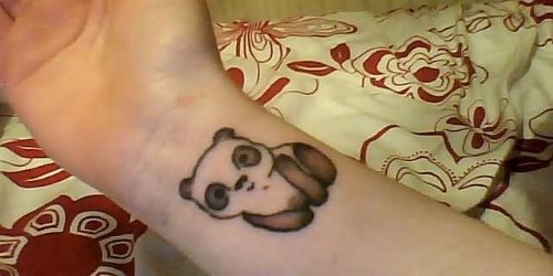 Cute Panda Bear Tattoo On Wrist