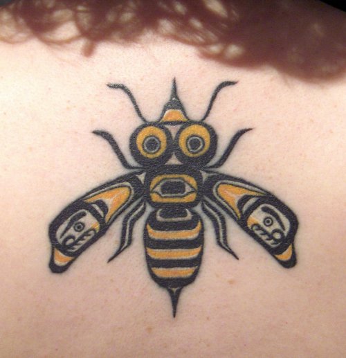 Black Tribal And Yellow Bee Tattoo