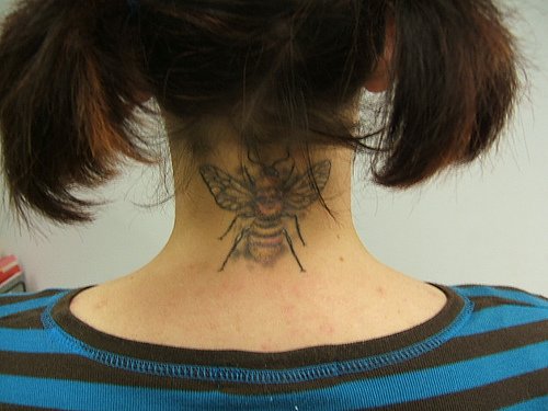 Bee Tattoo On Girl Nape