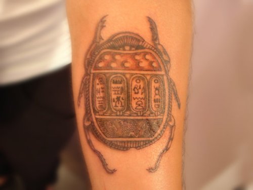 Grey Ink Scarab Beetle Tattoo On Arm