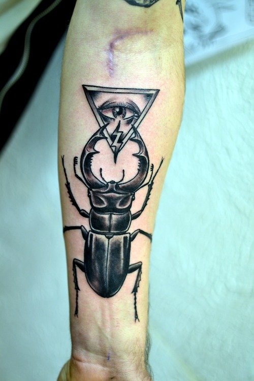 Illuminati Eye and Beetle Tattoo On Arm